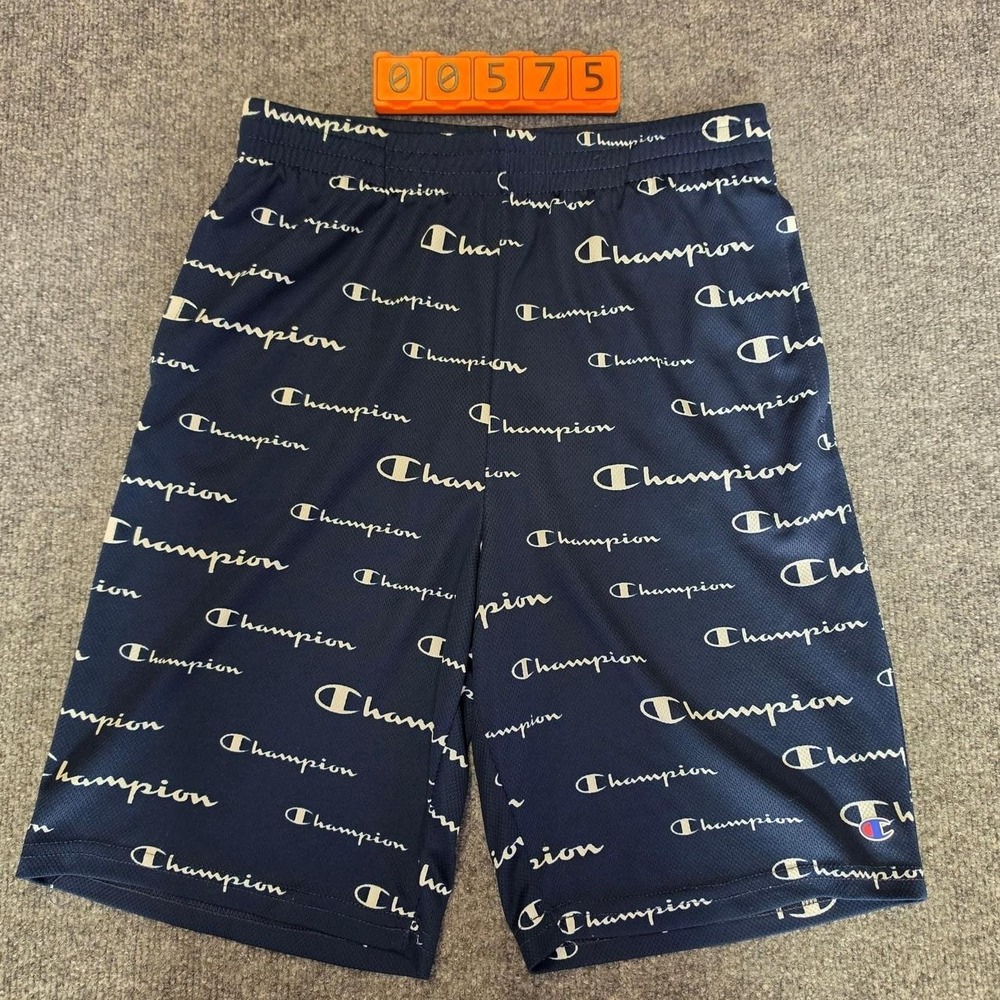 Champion navy blue shorts with white 'Champion' script logo, size 18/20